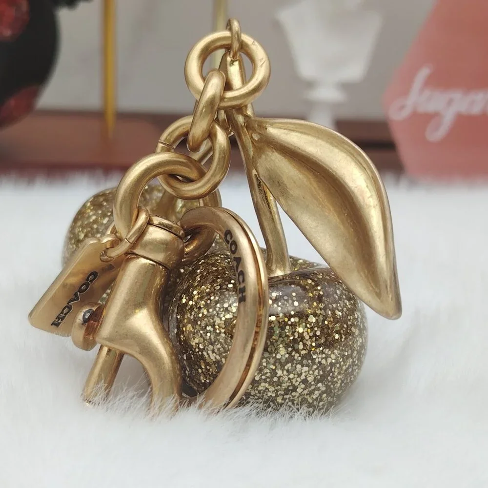 Coach cherry bag charm_3